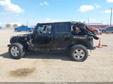 Jeep Wrangler Unlimited Sahara 1C4BJWEGXFL604130 снимка