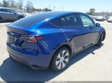 Tesla Model Y Awd/Long Range Dual Motor All-Wheel Drive 7SAYGAEE4PF636380 photo