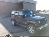 Jeep Wrangler Unlimited Sahara 1J4BA5H17AL145353 photo