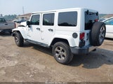 Jeep Wrangler Unlimited Sahara 1C4BJWEG1GL318975 снимка