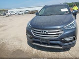 Hyundai Santa Fe Sport 2.4L 5NMZU3LB5HH001604 photo