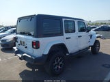 Jeep Wrangler 4-Door Freedom 4X4 1C4HJXDG7PW582704 снимка