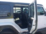 Jeep Wrangler 4-Door Freedom 4X4 1C4HJXDG7PW582704 снимка