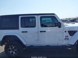 Jeep Wrangler 4-Door Freedom 4X4 1C4HJXDG7PW582704 снимка