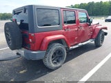 Jeep Wrangler Unlimited Sahara 1J4BA5H1XBL569417 fotografie