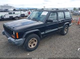 Jeep Cherokee Sport 1J4FT48S0YL219303 снимка