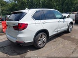 BMW X5 xDrive50I 5UXKR6C54F0J76274 снимка