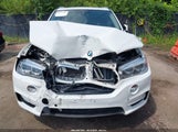 BMW X5 xDrive50I 5UXKR6C54F0J76274 снимка