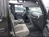 Jeep Wrangler Unlimited Sahara 1J4BA5H11AL156817 fotografie