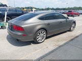 Audi A7 3.0T Premium Plus WAU2GAFC0EN118990 снимка