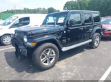 Jeep Wrangler Unlimited Sahara 4X4 1C4HJXEG3KW637690 photo