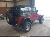 Jeep Wrangler Sport 1J4FA49S9YP731865 снимка