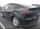 Tesla Model Y Performance Dual Motor All-Wheel Drive 7SAYGDEF7PF980571 photo