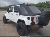 Jeep Wrangler Unlimited Sahara 1C4BJWEGXCL251108 photo