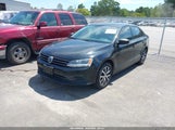 Volkswagen Jetta 1.4T Se 3VWD67AJ1GM390479 fotografie