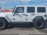 Jeep Wrangler Unlimited Sahara 1C4BJWEG3CL271362 снимка