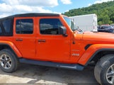 Jeep Wrangler Unlimited Sahara 4X4 1C4HJXEG6KW661546 снимка