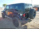 Jeep Wrangler Unlimited Sahara 1C4BJWEG7EL142432 снимка