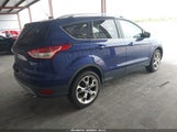 Ford Escape Titanium 1FMCU9JX0EUD22859 photo