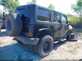 Jeep Wrangler Unlimited Sport 1J4BA3H11BL575370 fotografie