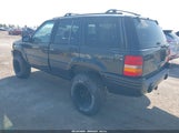 Jeep Grand Cherokee Limited 1J4GZ78Y8WC297382 photo