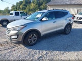 Hyundai Santa Fe Sport 2.4L 5XYZUDLB8GG324883 photo