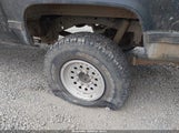 Chevrolet Suburban V2500 1GNGV26K9KF127972 снимка