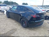 Tesla Model Y Performance Dual Motor All-Wheel Drive 5YJYGDEF1MF121694 photo