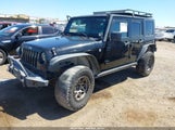 Jeep Wrangler Unlimited Sahara 1J4GA59108L506940 fotografie