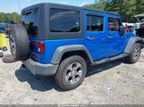 Jeep Wrangler Unlimited Sport 1C4HJWDGXFL553076 снимка