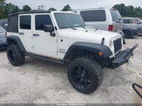 Jeep Wrangler Unlimited Sport 1J4BA3H11AL125443 снимка