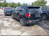 Honda Passport Awd Ex-L 5FNYF8H57LB012264 fotografie