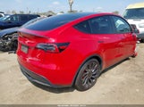 Tesla Model Y Performance Dual Motor All-Wheel Drive 7SAYGDEF6PF898895 photo