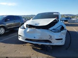 Tesla Model Y Long Range Dual Motor All-Wheel Drive 5YJYGDEE7MF138166 fotografie