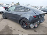 Tesla Model Y Performance Dual Motor All-Wheel Drive 7SAYGDEF2PF864243 photo
