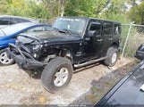 Jeep Wrangler Unlimited Sport 1C4HJWDG7FL648467 fotografie