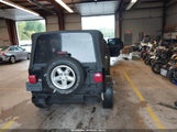 Jeep Wrangler Sport 1J4FA49S3YP716715 снимка