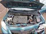 Toyota Corolla Le JTDBU4EE7A9105673 снимка