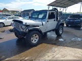 Jeep Wrangler Rubicon 1J4FA69S55P345144 снимка