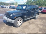 Jeep Wrangler Unlimited Sahara 1C4BJWEGXFL557844 photo
