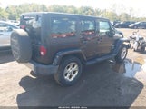 Jeep Wrangler Unlimited Sahara 1C4BJWEGXFL557844 photo