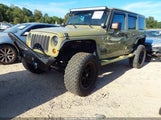 Jeep Wrangler Unlimited Freedom Edition 1C4HJWDGXDL584549 снимка