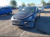 Tesla Model Y Performance Dual Motor All-Wheel Drive 5YJYGDEF5MF084066 photo