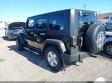Jeep Wrangler Unlimited Sport 1J4BA3H15AL150894 снимка