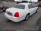 Lincoln Town Car Signature 1LNHM81W54Y655413 photo