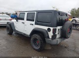 Jeep Wrangler Unlimited Sport 1C4BJWDG8GL159227 photo