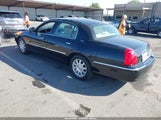 Lincoln Town Car Signature Limited 2LNBL8CV3AX613153 photo