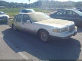 Lincoln Town Car Signature/Spinnaker 1LNLM82W7SY666144 снимка