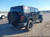 Jeep Wrangler Unlimited Altitude 1C4BJWEG4EL257327 photo