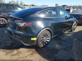 Tesla Model Y Performance Dual Motor All-Wheel Drive 7SAYGDEF8NF340592 photo